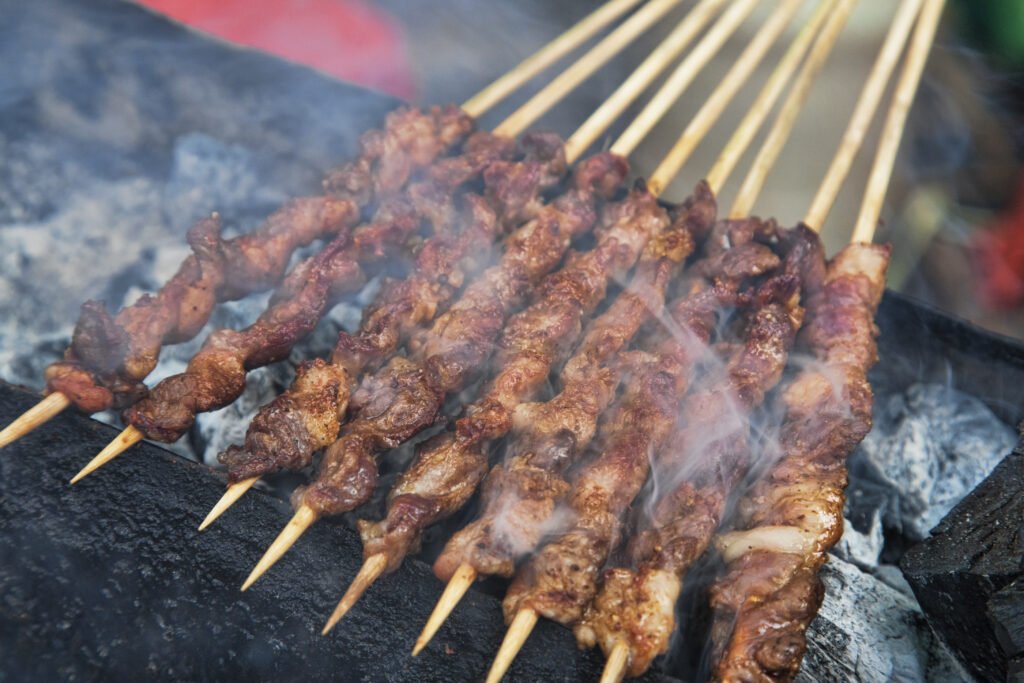 delicious-street-food-of-barbecued-lamb-shish-kebabs-in-guilin-4633381275