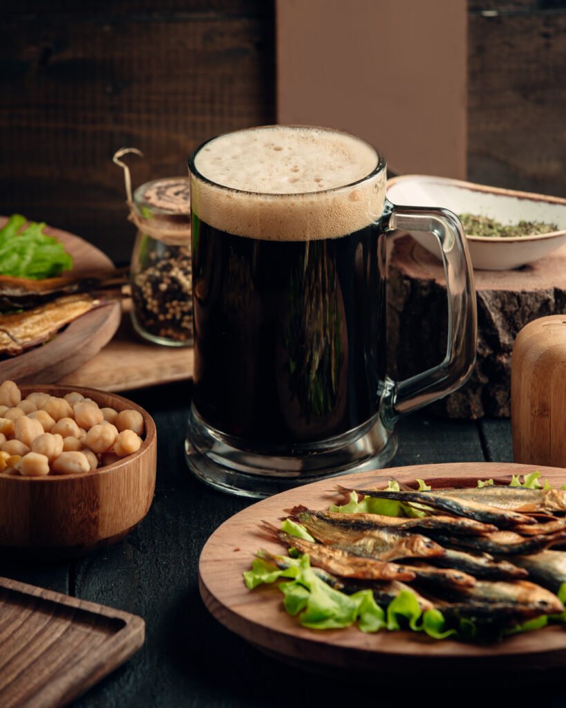 smoked sprat, boiled chickpeas served with a mug of beer