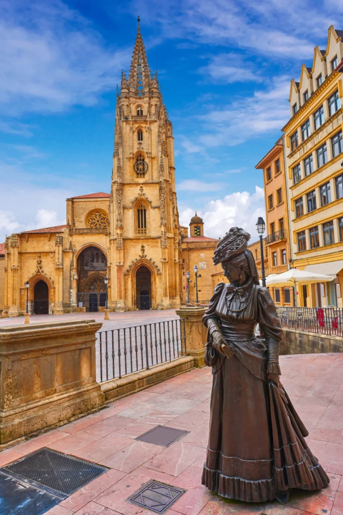 This image has an empty alt attribute; its file name is oviedo-cathedral-regenta-statue-asturias-scaled.jpg