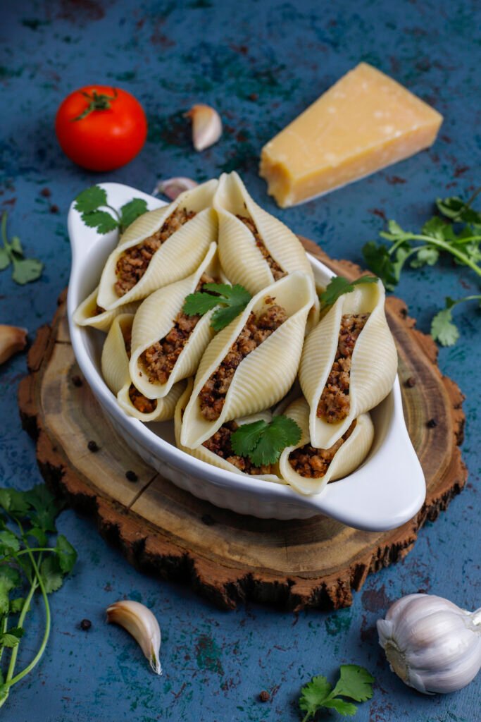Italian pasta Conchiglioni Rigati stuffed with meat.