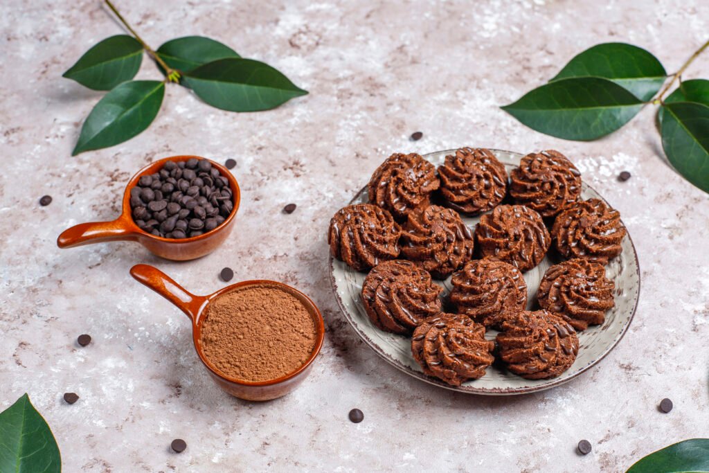 Mini cakes truffles with chocolate drops and cocoa powder,top vi