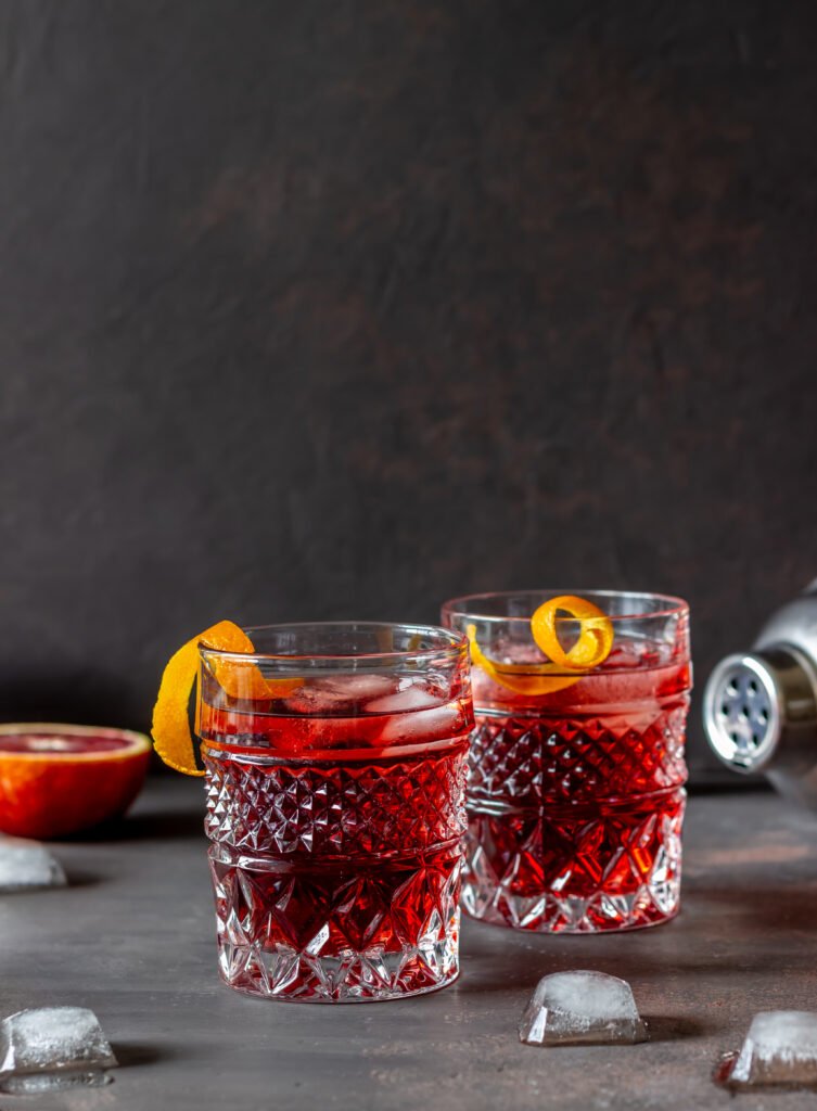 Negroni cocktail. Bitter, gin, vermouth, ice. Bar. Recipes. Alcoholic beverages.