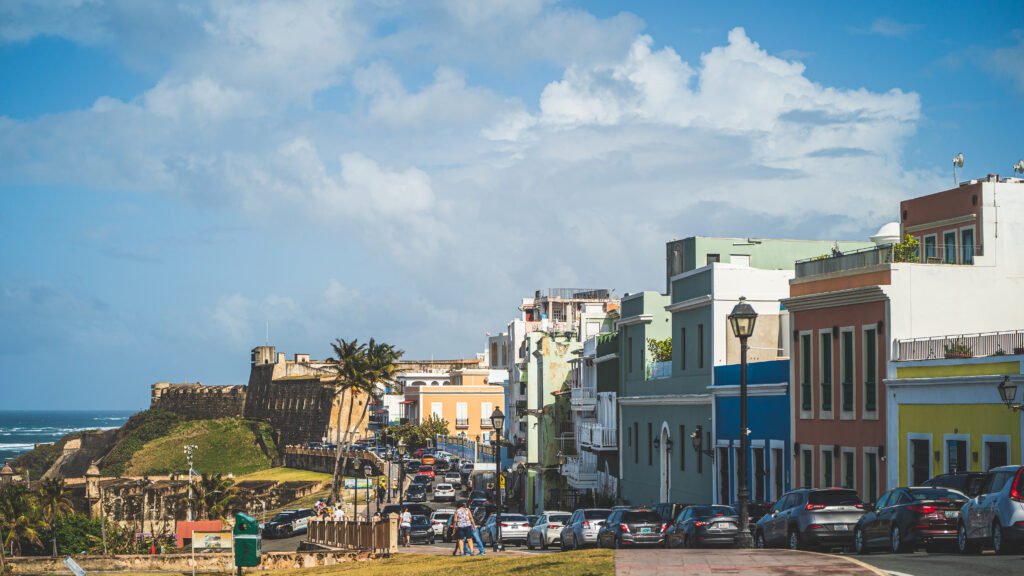 old-san-juan-puerto-rico-cars-parked-street-against-clouds-blue-sky Puerto Rico - old-san-juan-cars-parked-street-against-clouds-blue-sky