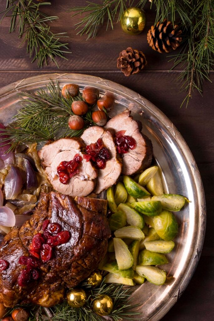 top-view-christmas-steak-plate-with-pine-cones-decor