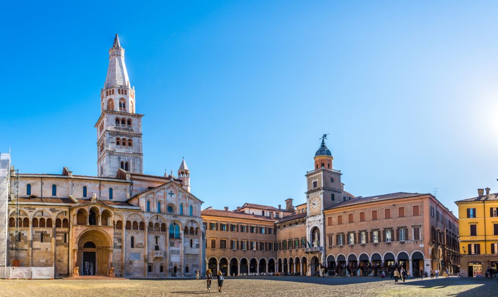 view-at-the-grande-place-with-cathedral-tower-ghirlandina-and-city-hall-in-modena-italy-810508723610