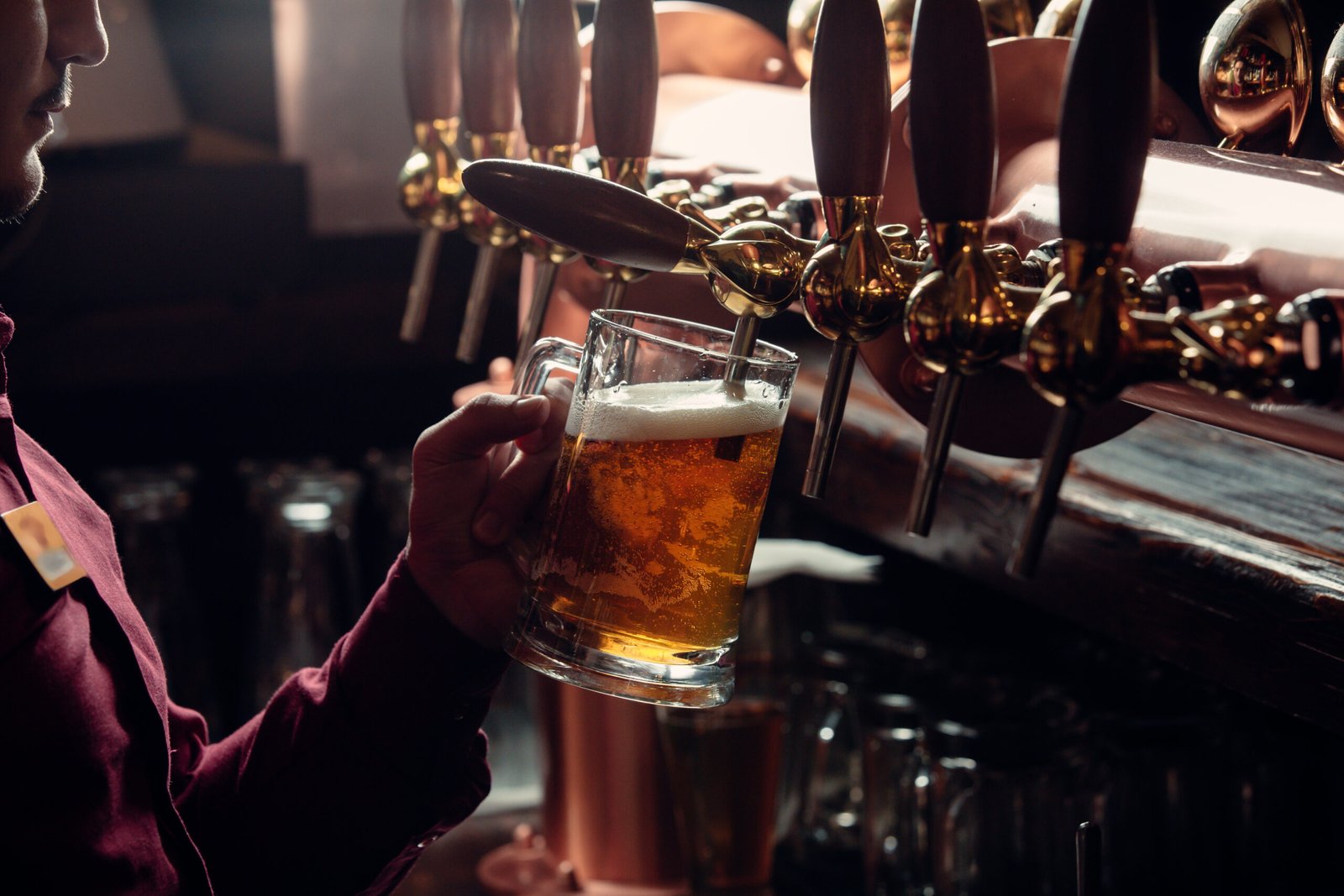 bartender-fills-beer-mug-from-beer-tap