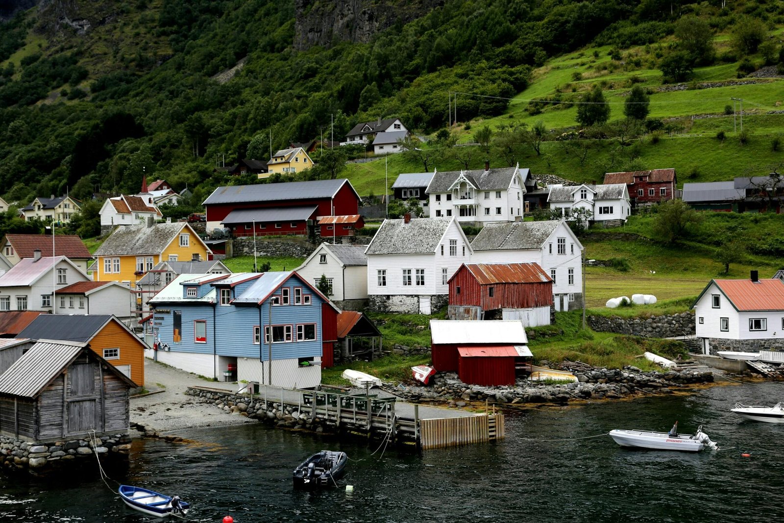 Colorful Scandinavian houses nestled by the fjord in Stavanger, Norway.