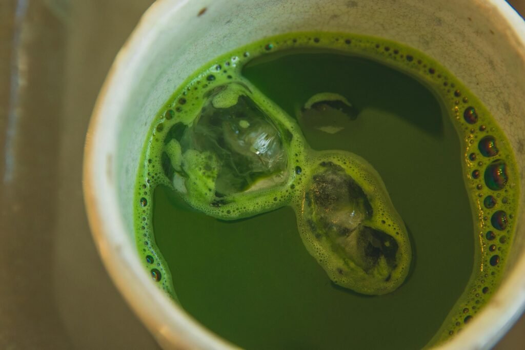 pexels-photo-6249729-6249729 Refreshing iced matcha green tea captured in a cup from above. Perfect for healthy drink lovers.